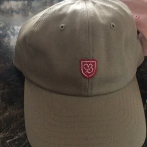 Brtixton champagne colored hat red emblem
